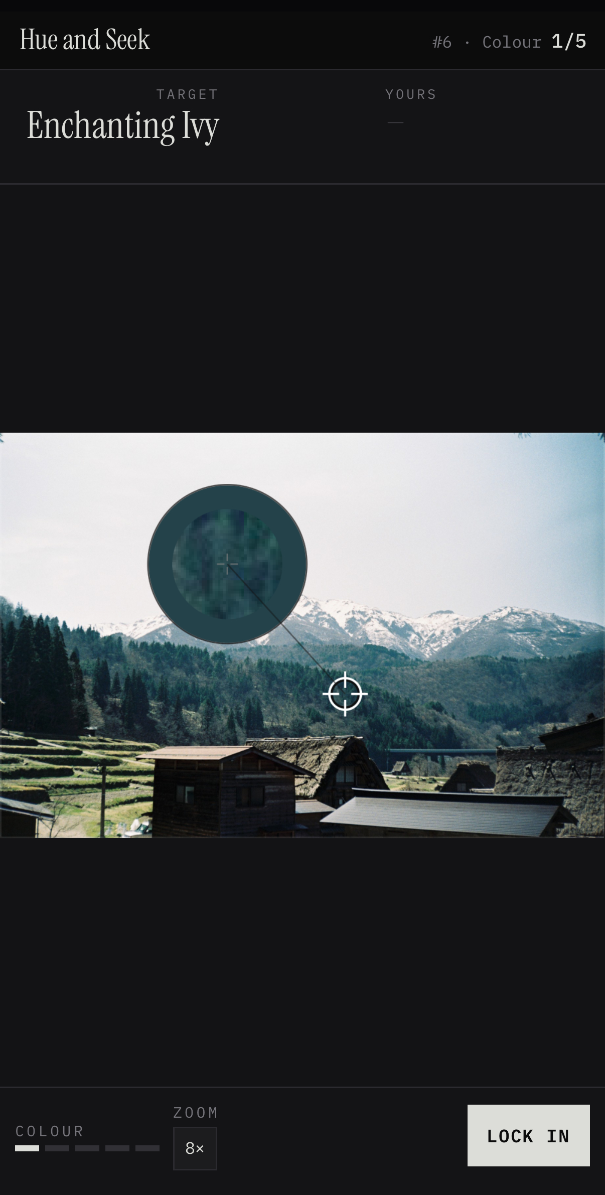 A round of Hue and Seek, with the loupe hovering over a photograph